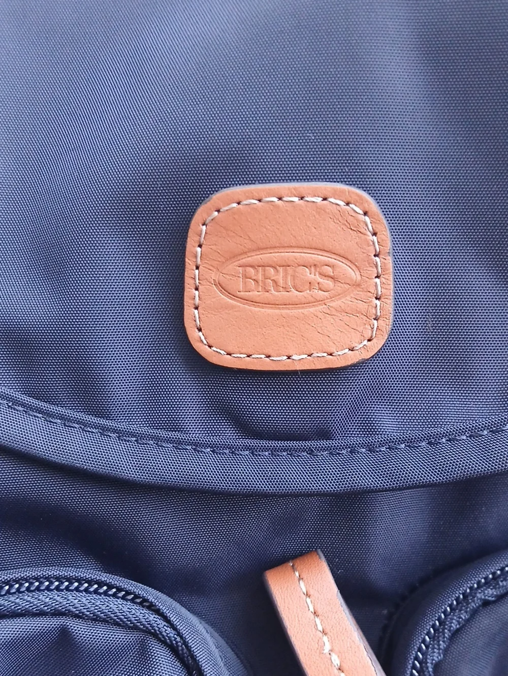Brics Navy Nylon Backpack with Brown Leather Trim .